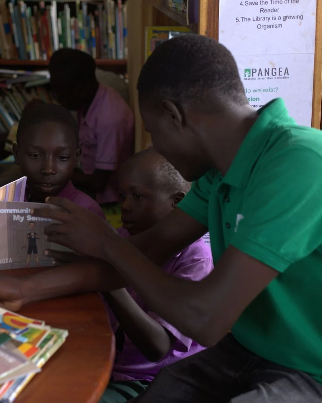 Our reading space at Imvepi Refugee Settlement is pure joy! ✨

Children sprawl across colorful mats, noses buried in picture books, eyes wide as they point at animals marching across the page or giggle at a funny monkey. Some trace the illustrations 