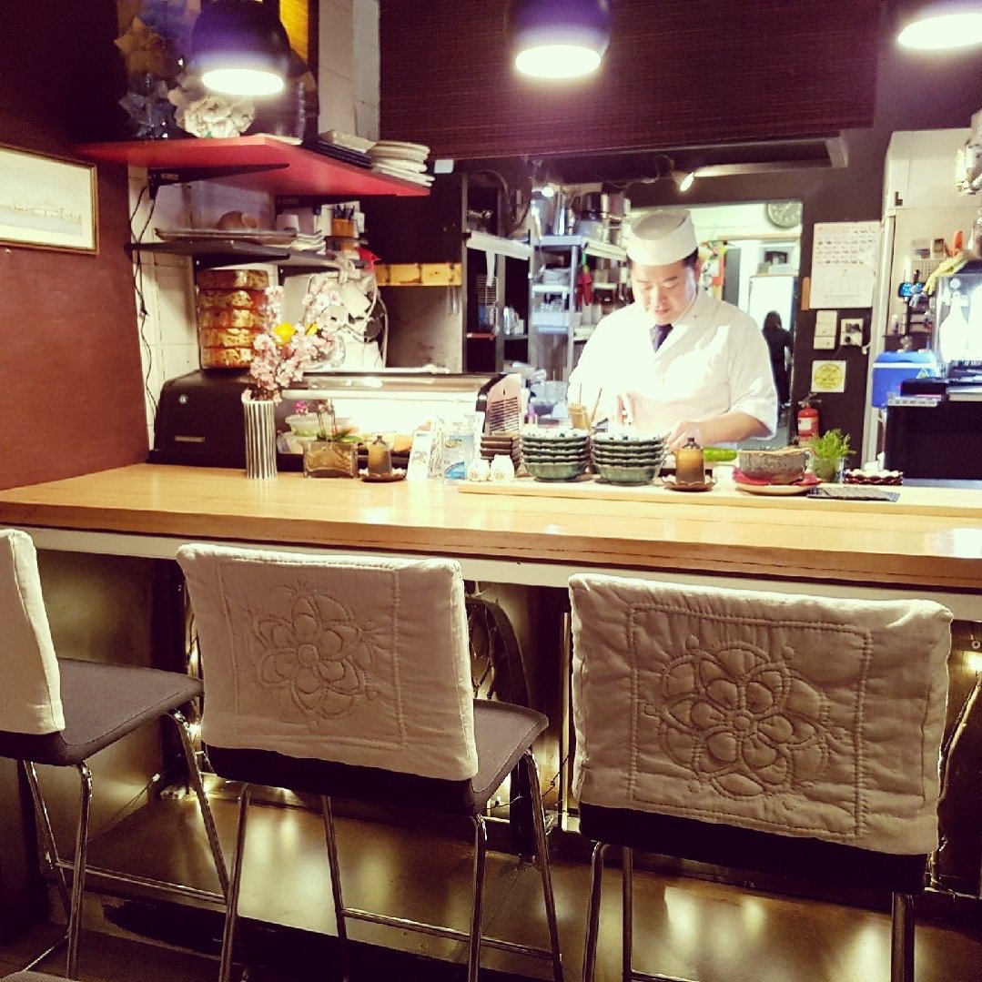 Raised quilt chair covers at Goemon Sushi restaurant, Mosman
