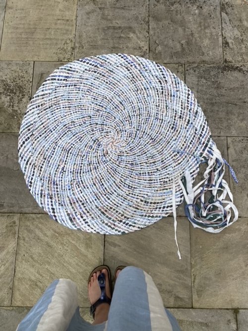Braided rag rug made from clothing and bedding foraged in the Cremorne Point and McMahons Point's fortnightly roadside rubbish