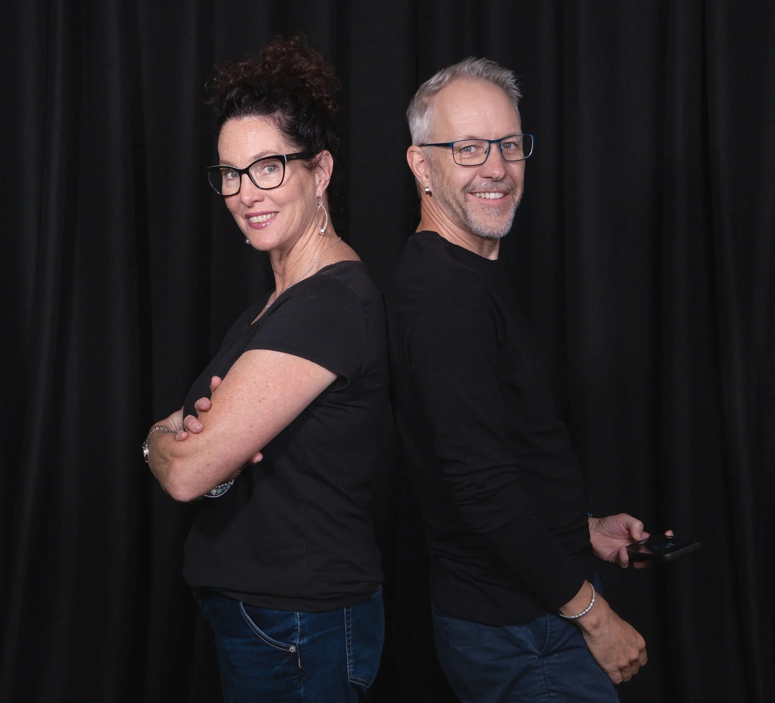 Louis and Bridgette Bolton standing back to back