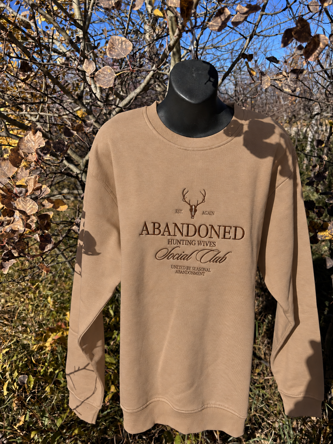 Camel sand embroidered crewneck outdoors.png