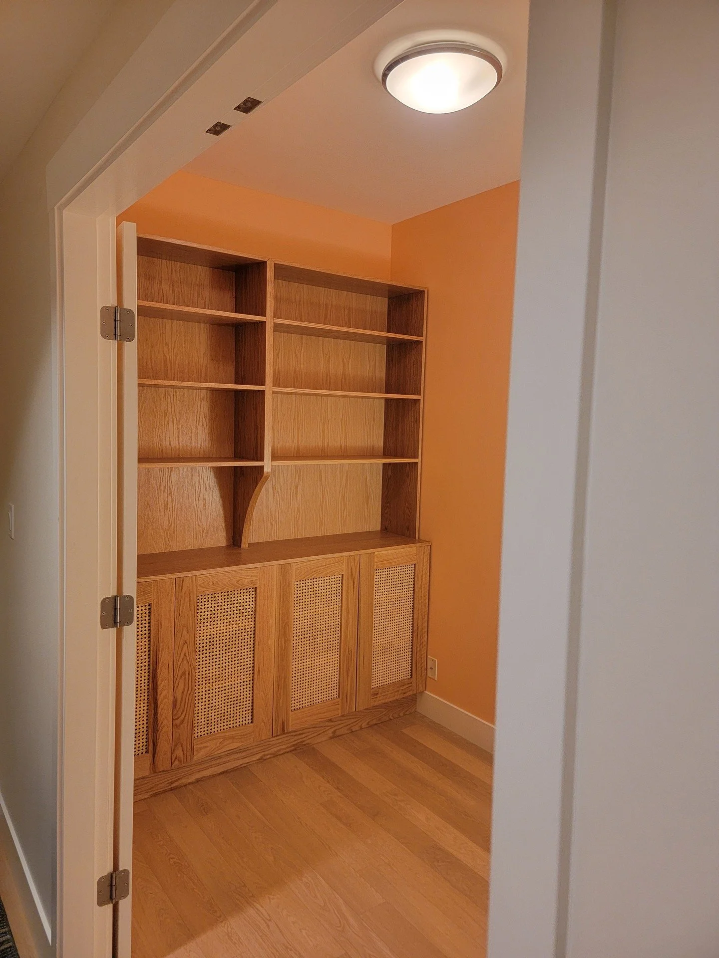 Full oak built in. Rattan doors bring breathability and a change of texture. One of my favourite projects to date and loved the final product. 

 Designed and built by me. Reach out if this is the type of thing you're looking for in your home! Commis