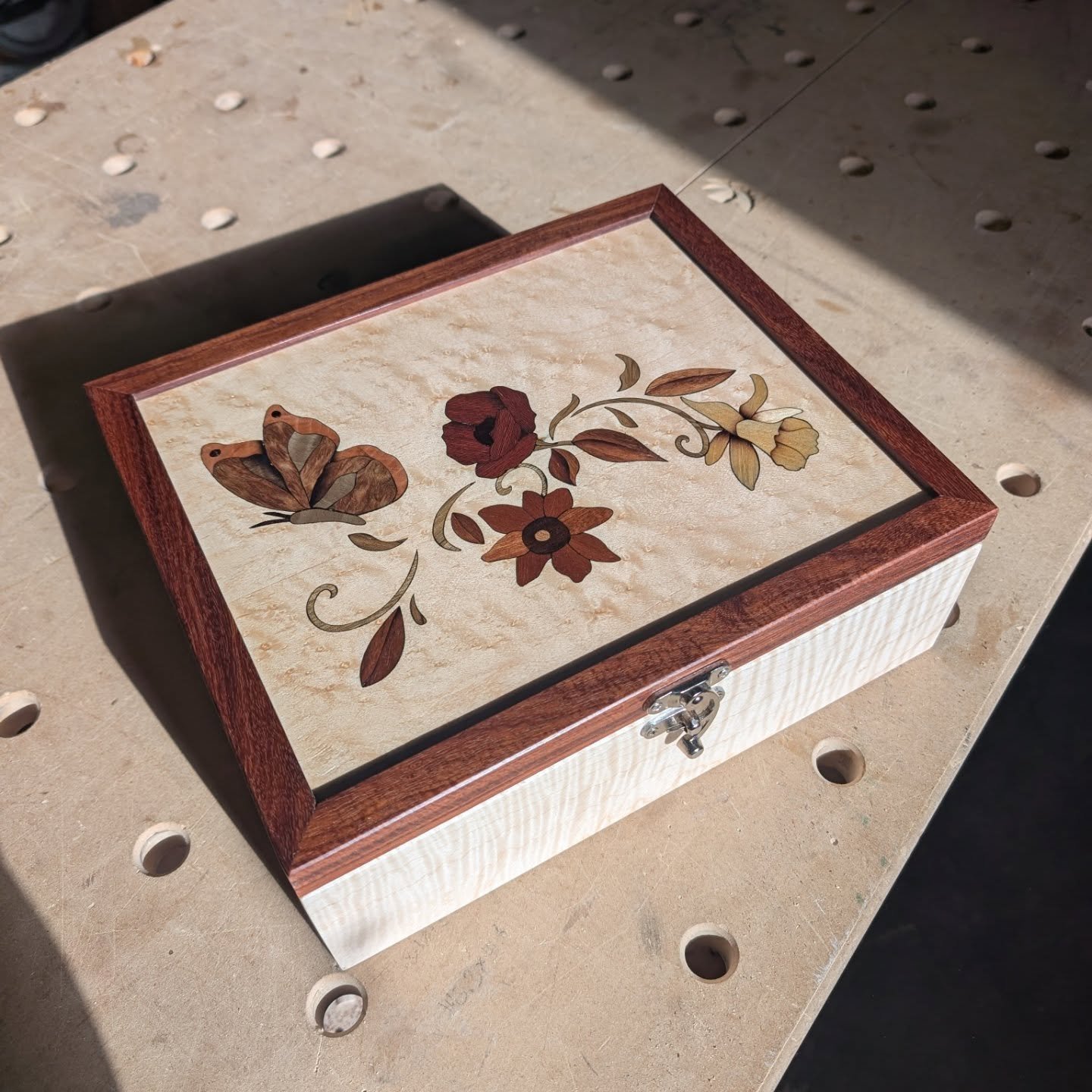 Custom order project.  Built this gorgeous maple and rosewood jewelery box with an inlay. 

Really proud of this project and super happy with how it came out