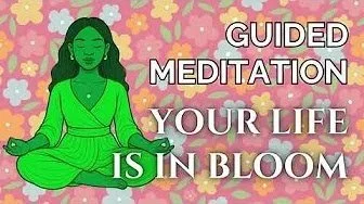 Illustration of a woman in a green outfit meditating with a floral background and the text 'Guided Meditation Your Life Is in Bloom'.
