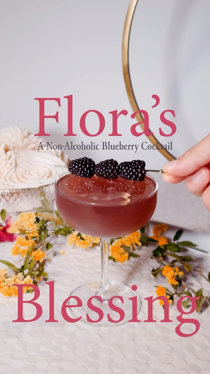 Flora’s Blessing: A Blueberry Non-alcoholic cocktail || Crafted with Notas de Agave Seedlip, organic blackberries and blueberries, cold-pressed apple juice, a touch of simple syrup, and finished with sparkling water, it’s a refreshing bur