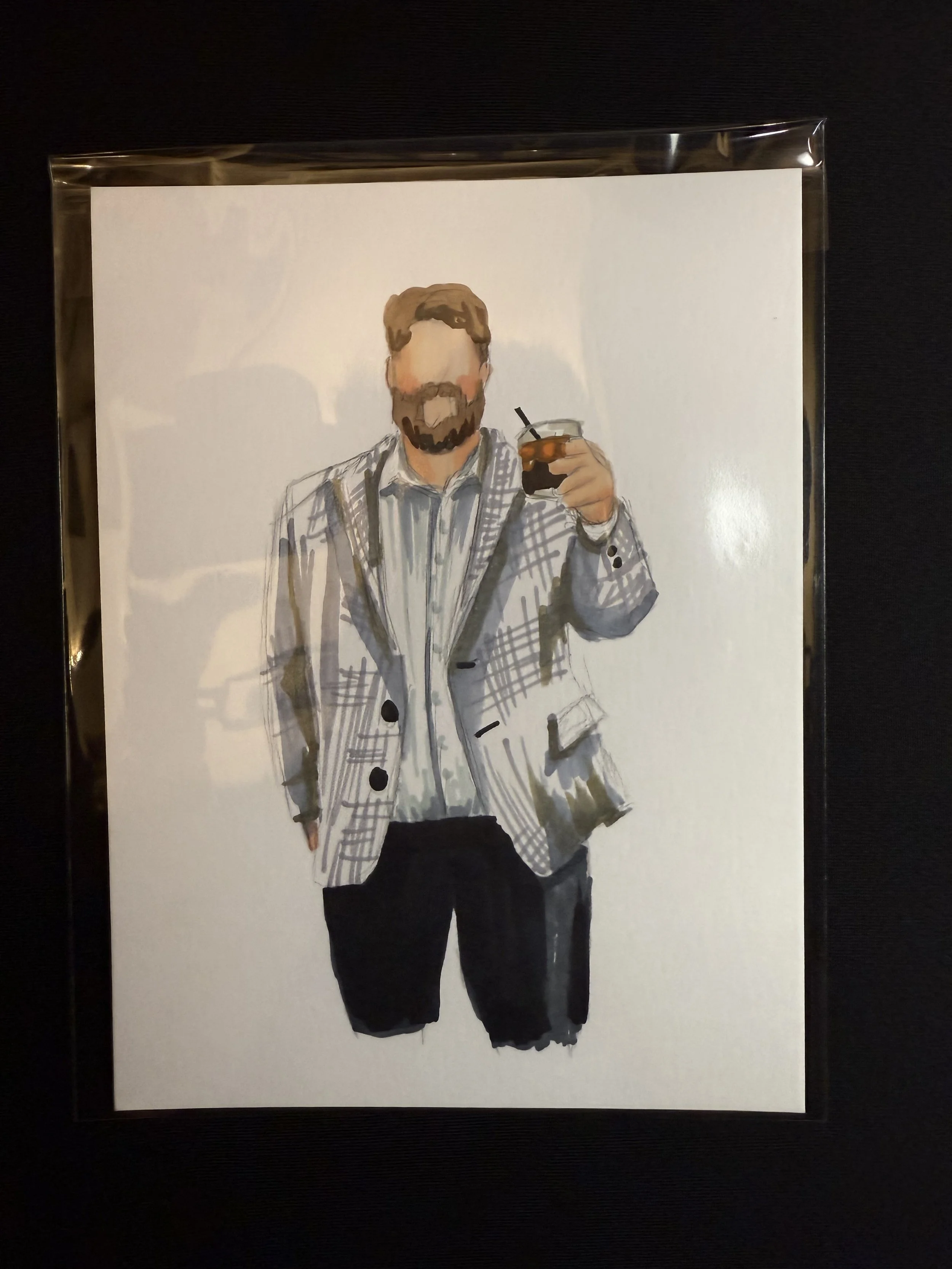 Hand-drawn illustration of a man with a beard wearing a grey checkered blazer over a shirt, holding a glass of whiskey with a straw, against a plain white background.