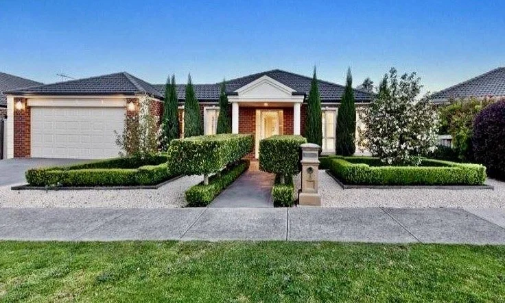Balance and symmetry reign on the Georgian Home front facade with stunning red bricks and cream quoin decoration on the corners. The garden is a deep green vista of English box hedges, crabapple trees and Italian cypress spires set off by cream grave