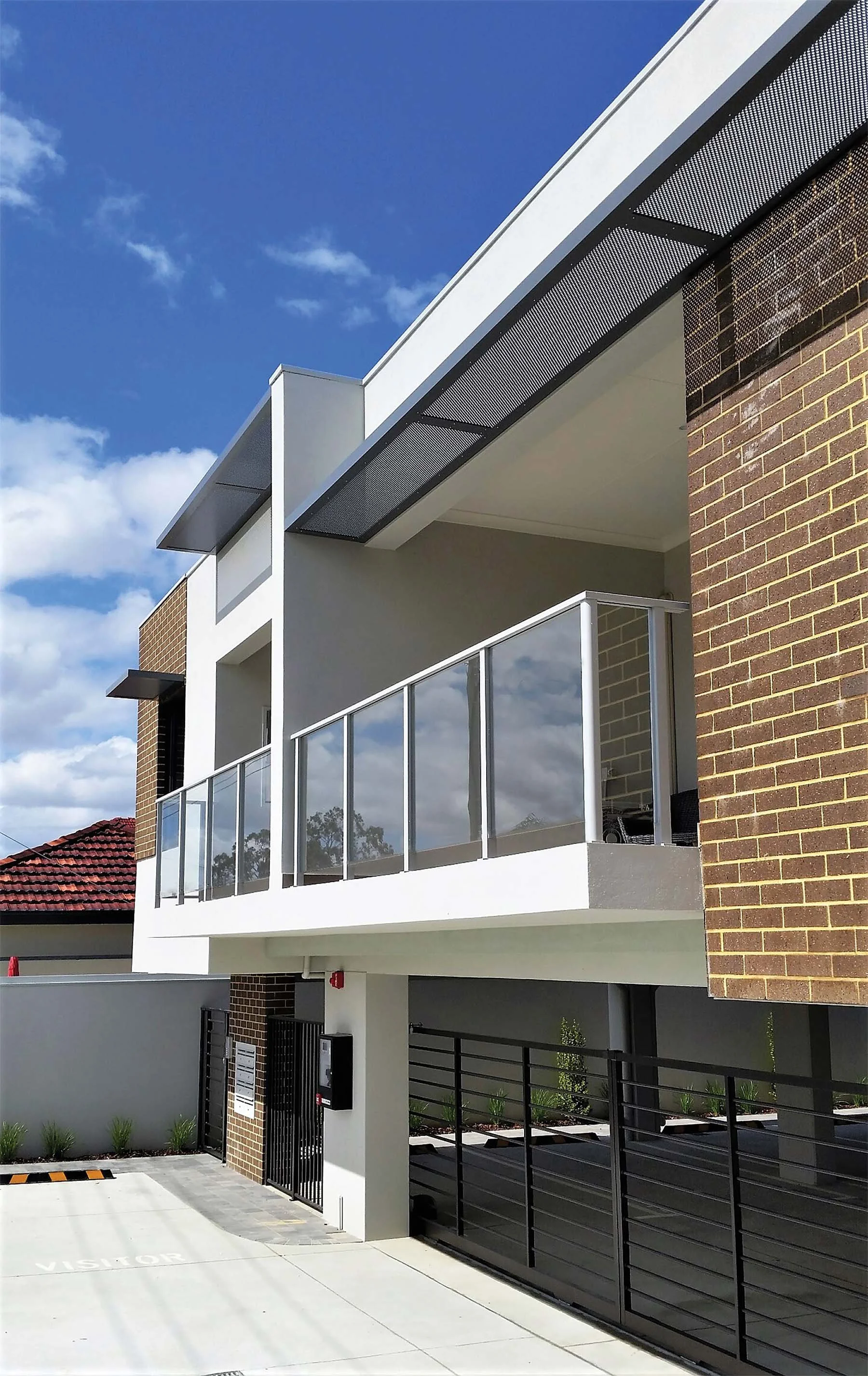 Vista Semi-frameless Balustrade, Punched Alum Awnings, Stirling Electric Sliding Gate.jpg