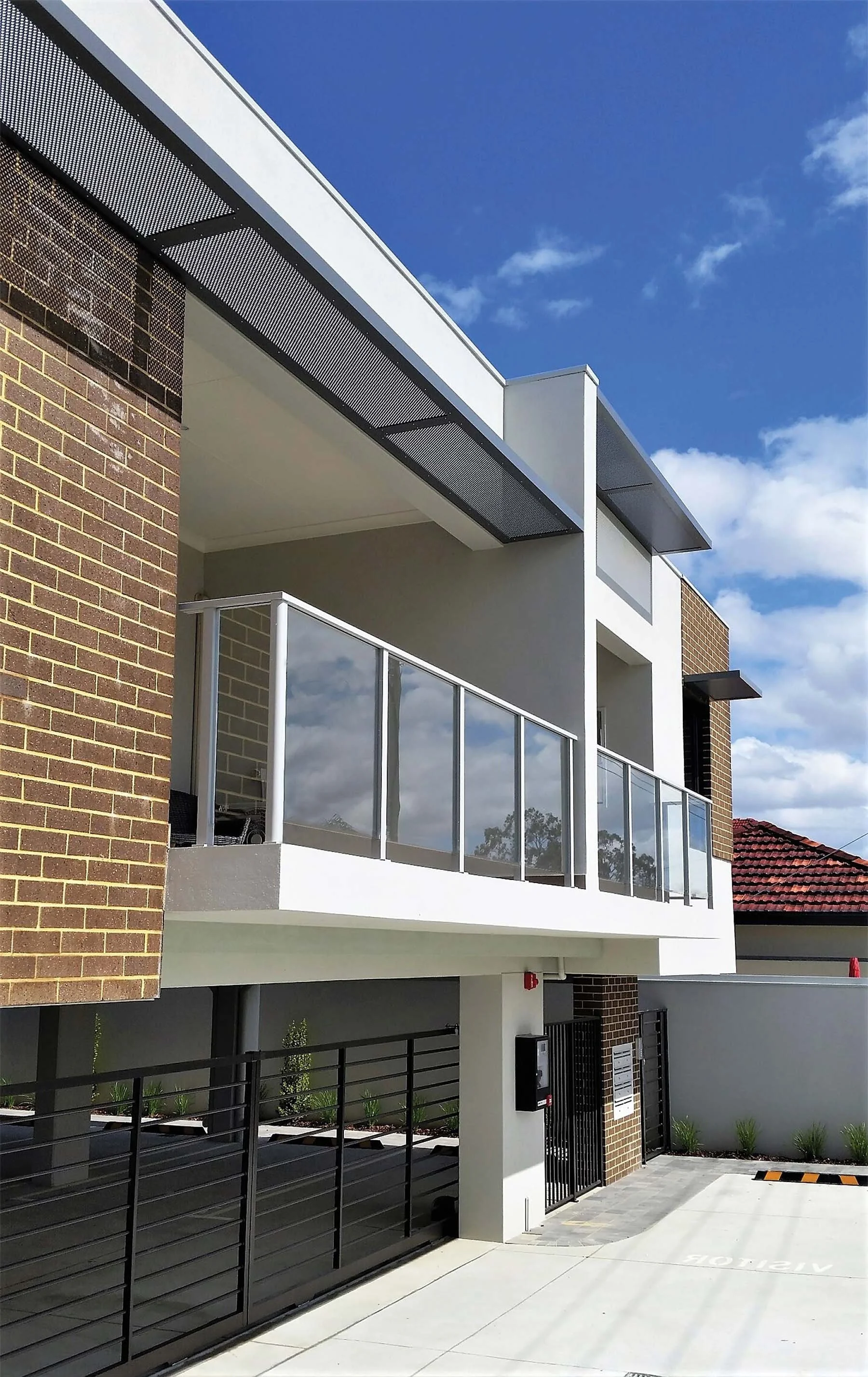 Vista Semi-frameless Balustrade, Punched Alum Awnings, Stirling Electric Sliding Gate.jpg