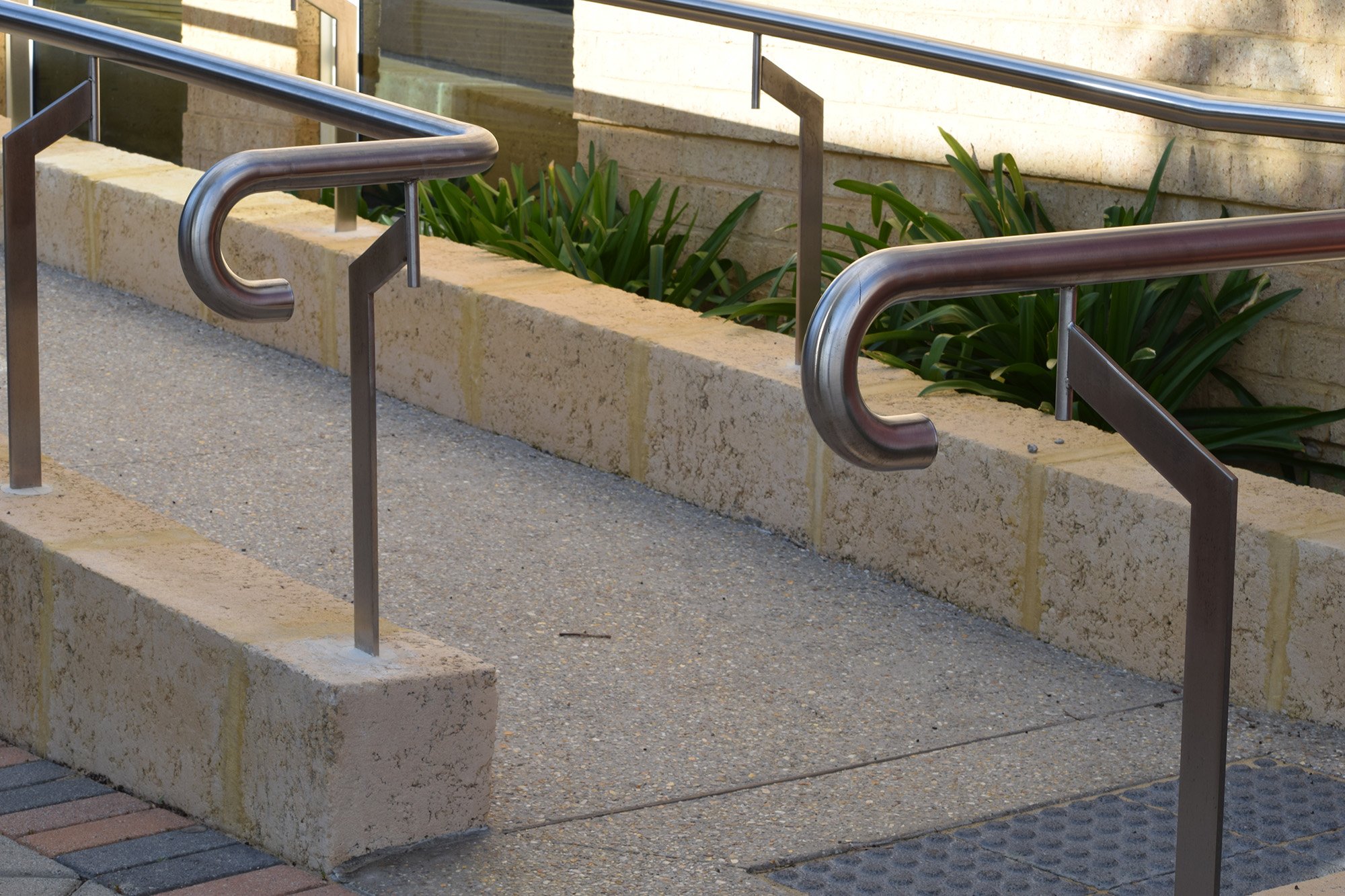 Angled stainless steel handrail.jpg