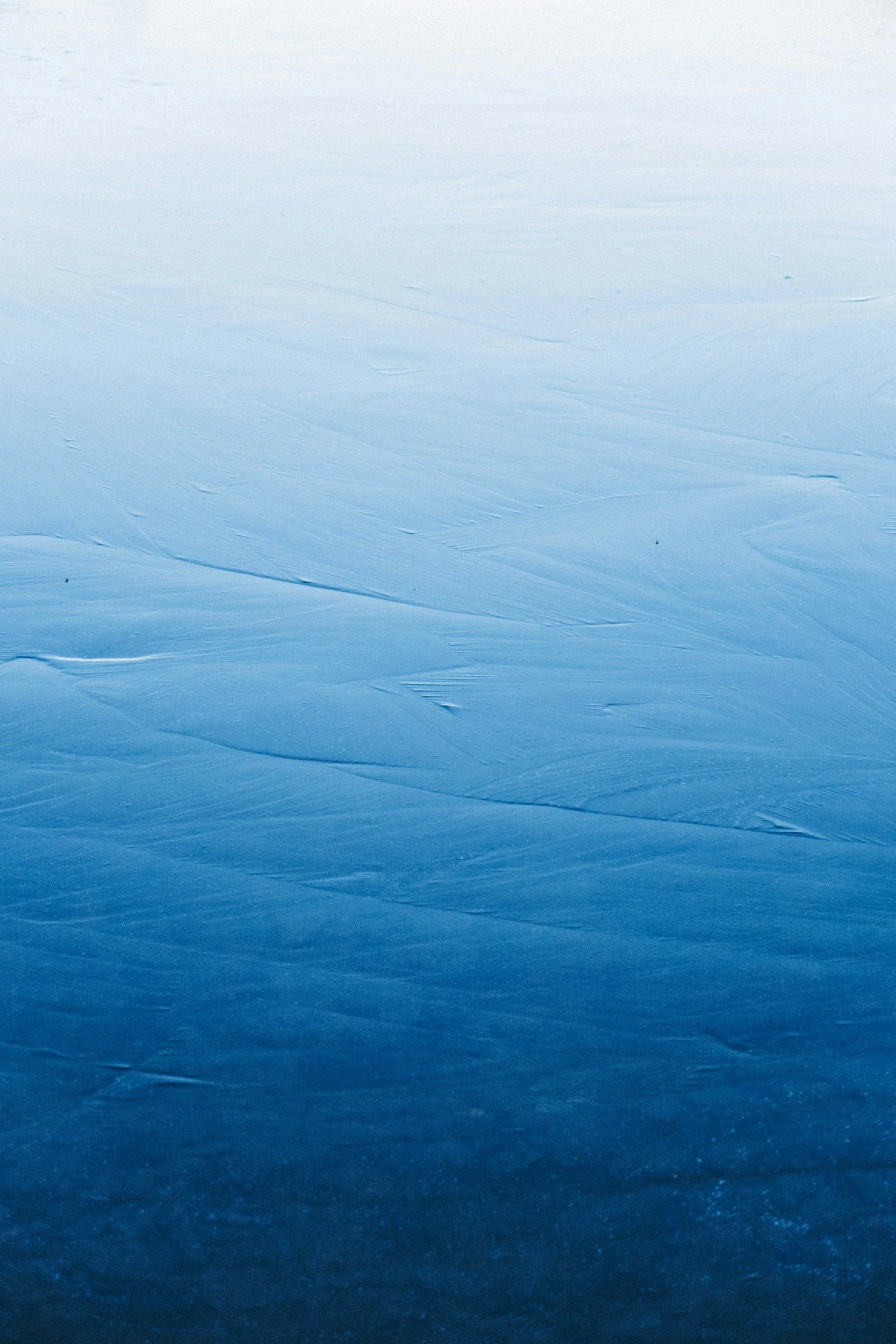frozen ice surface with blue tint