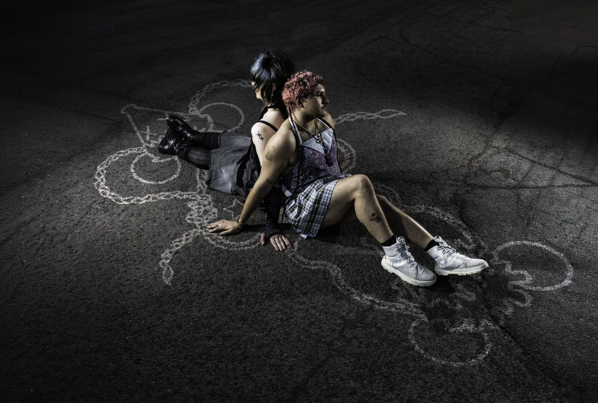  Two subjects seated on asphalt surrounded by chalk illustrations, digicore alternative photography, Lea The Wise