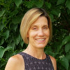 Woman wearing black short sleeve dress