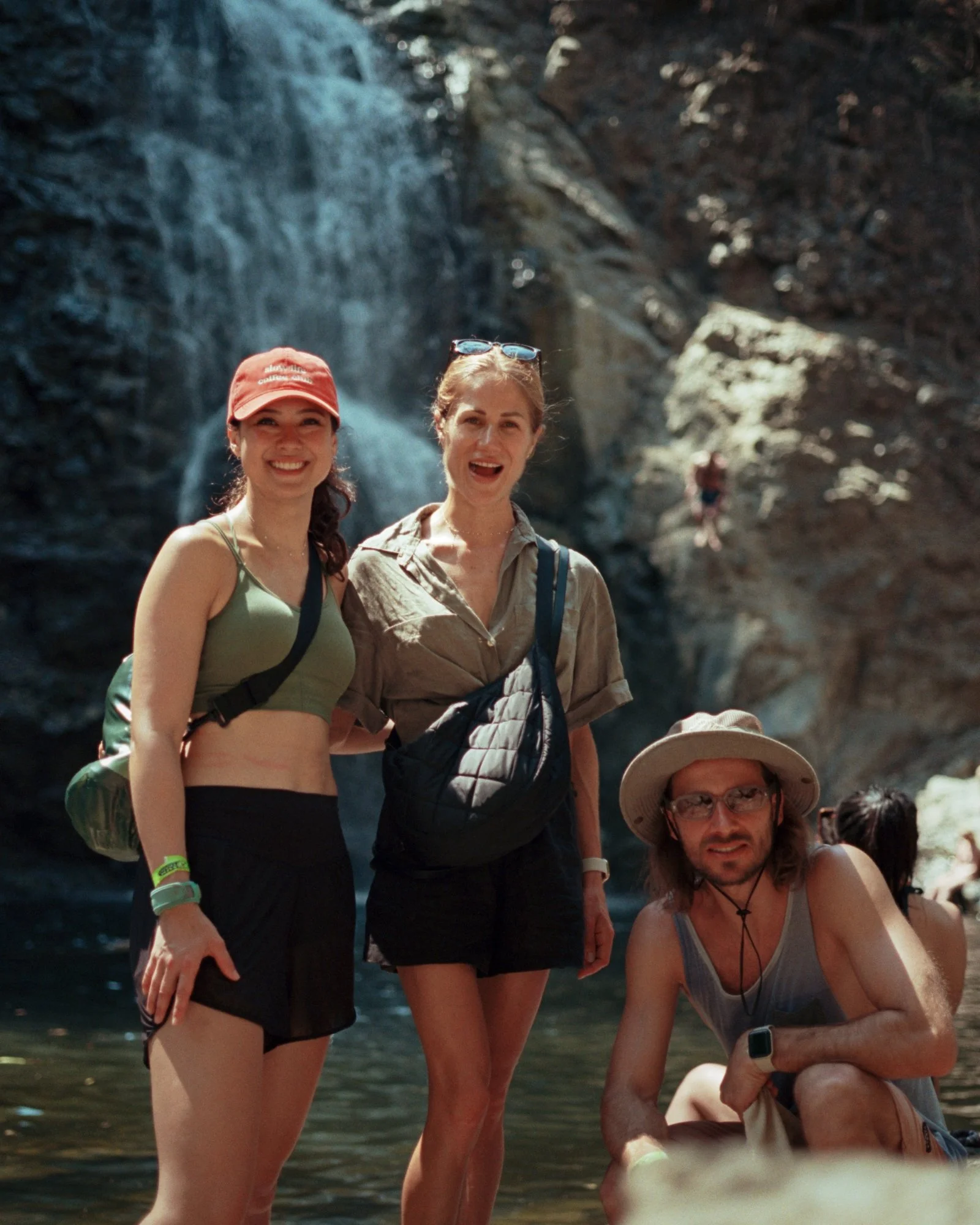Guests visiting a waterfall on a nature excursion near Santa Teresa, Costa Rica.