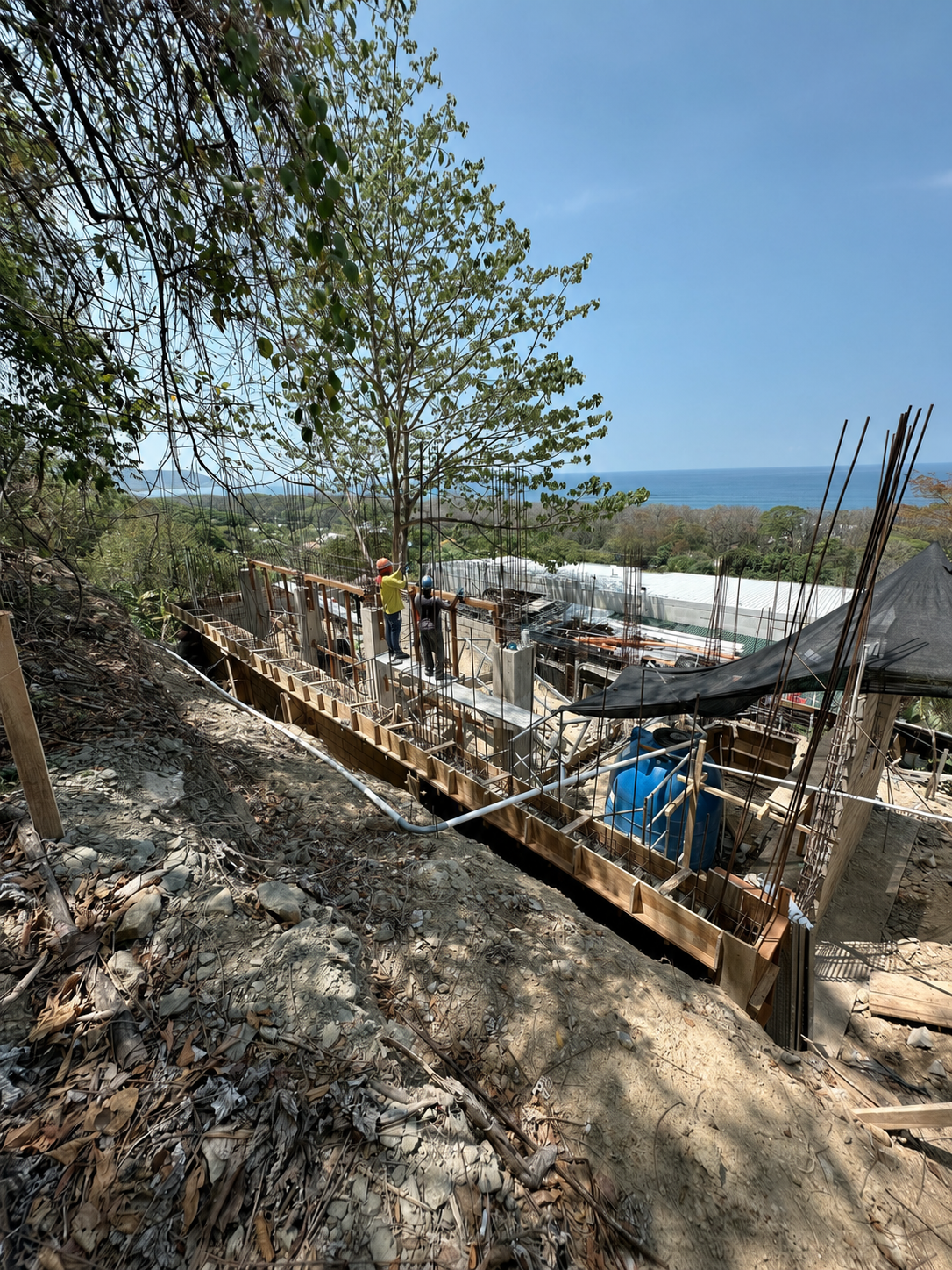 Construction of VISTA NALU on a hillside above Santa Teresa with views toward the Pacific Ocean.
