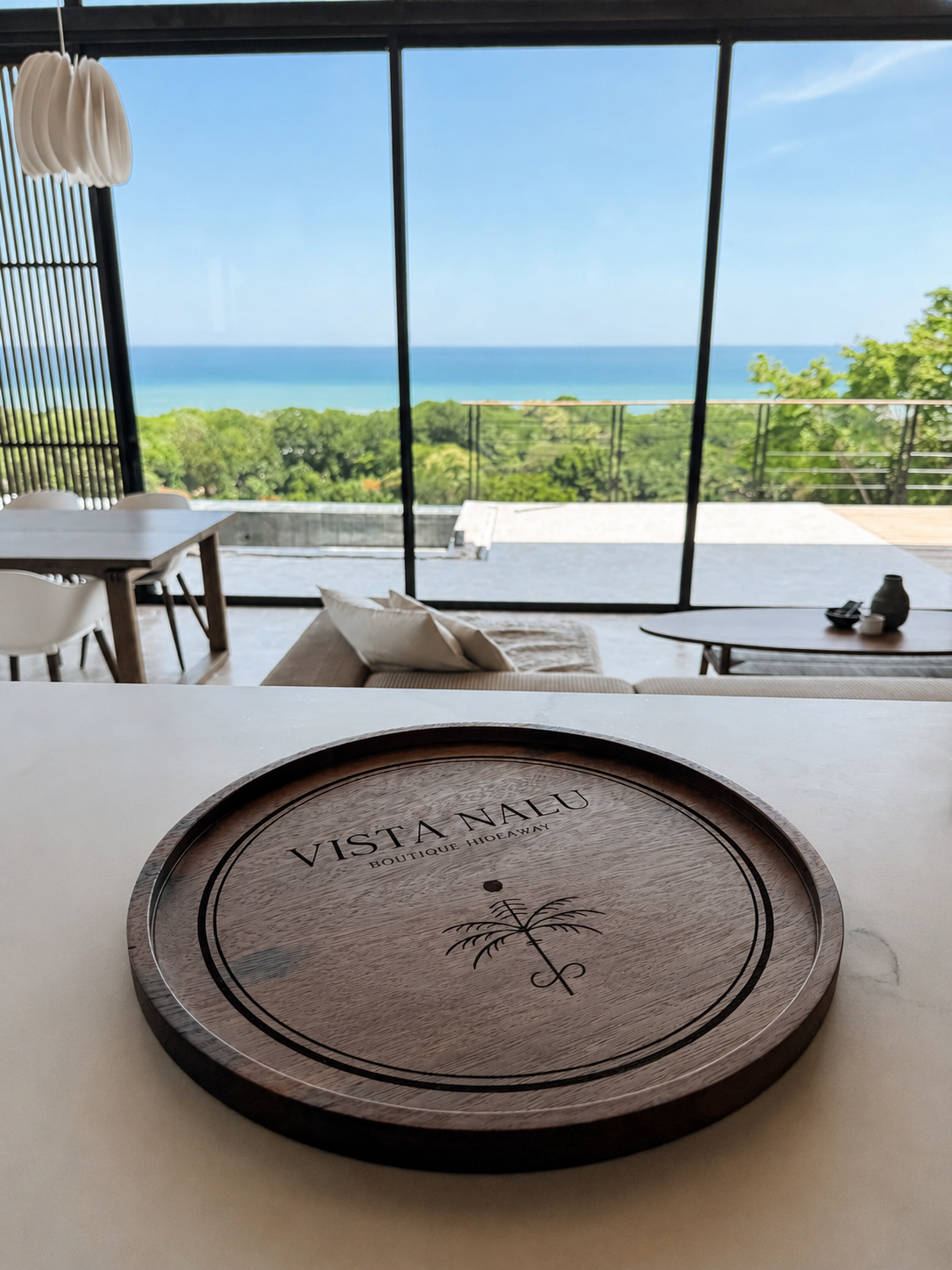 VISTA NALU wooden tray in an ocean-view villa overlooking the Pacific and tropical forest.