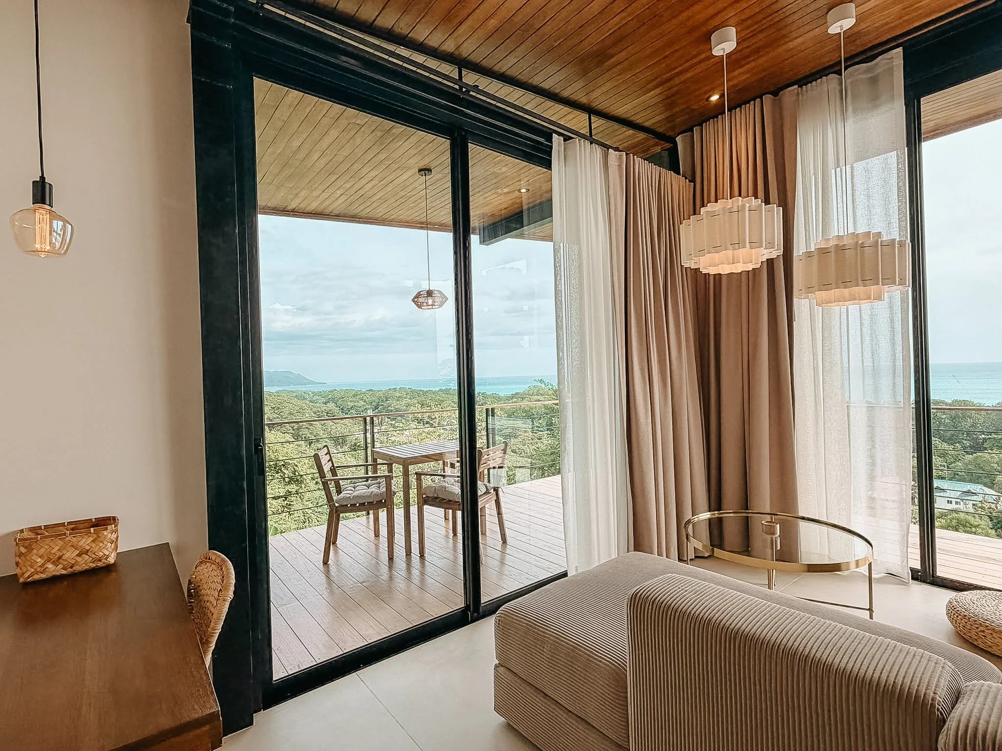 Dedicated workspace at Casa Surya beside the private balcony with panoramic ocean views.