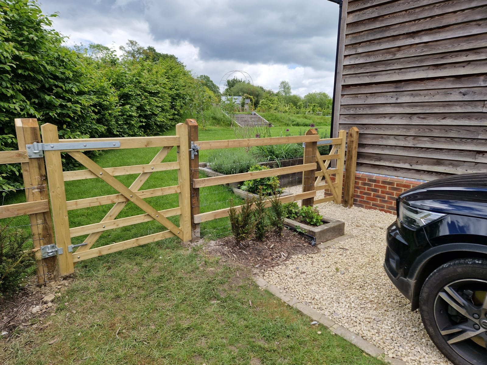 Five Bar Gate with Post and Rail Fencing