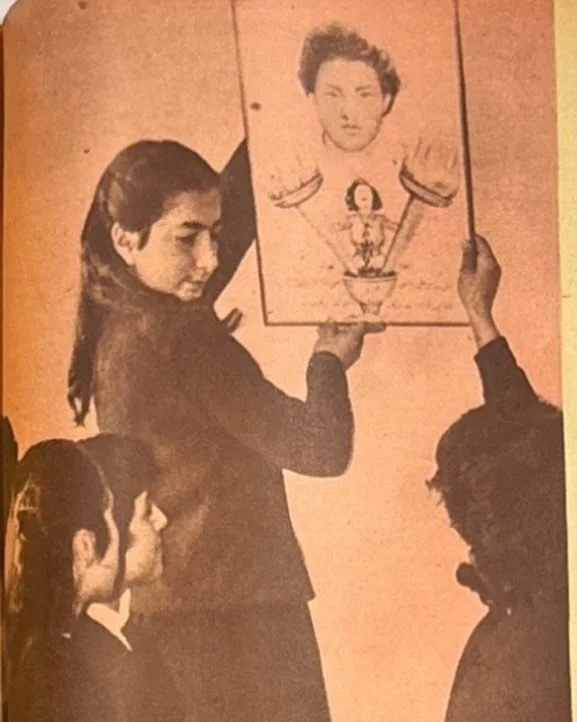 Schoolgirls in Jordan putting up a drawing of their classmate who was martyred by Zionist forces. In نحن العرب magazine. ١٩٦٢