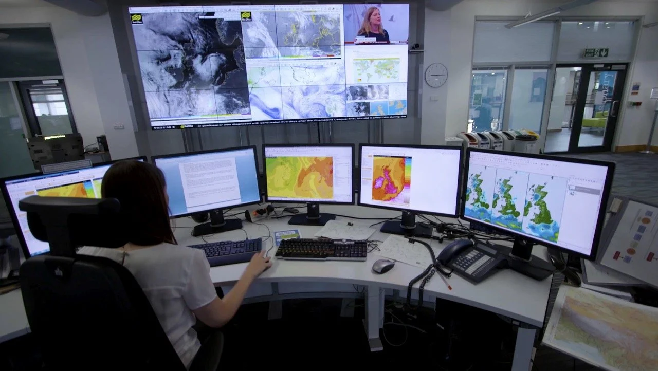 Still image from ICE inauguration film 'Shaping Zero' featuring Rachel Skinner in MET office presenting message on Net Zero