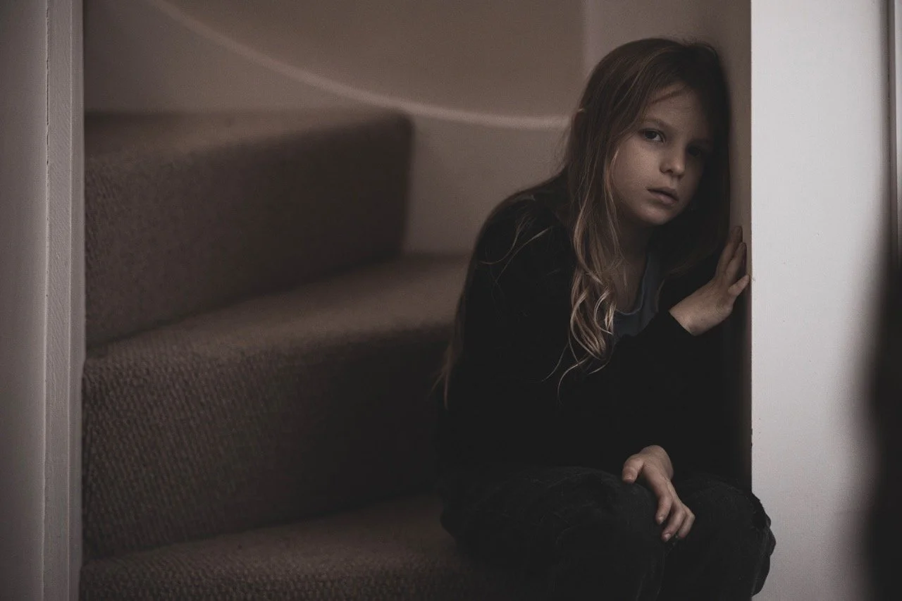 Young female actor in London in Barnardo's poverty campaign by Wind & Foster