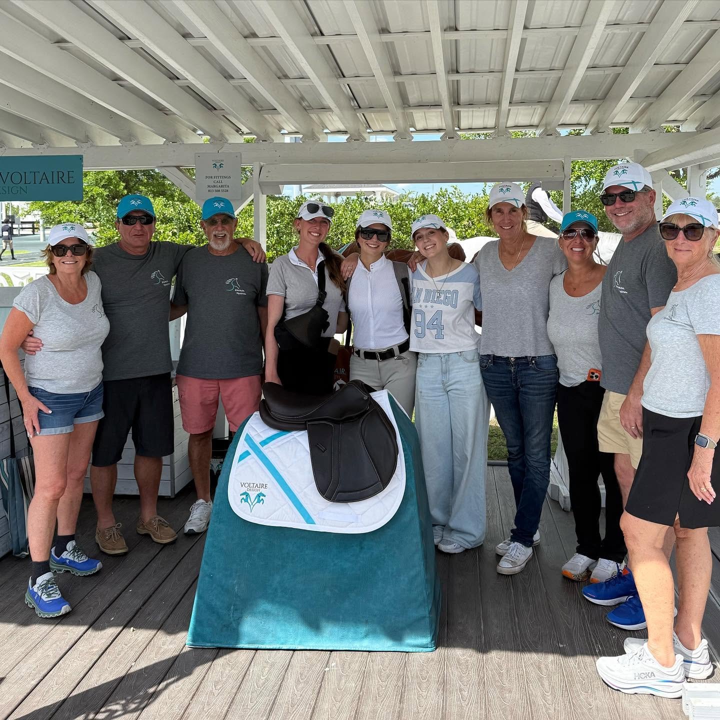 Group photo: Sammon Equestrian riders and trainers at a Florida horse show