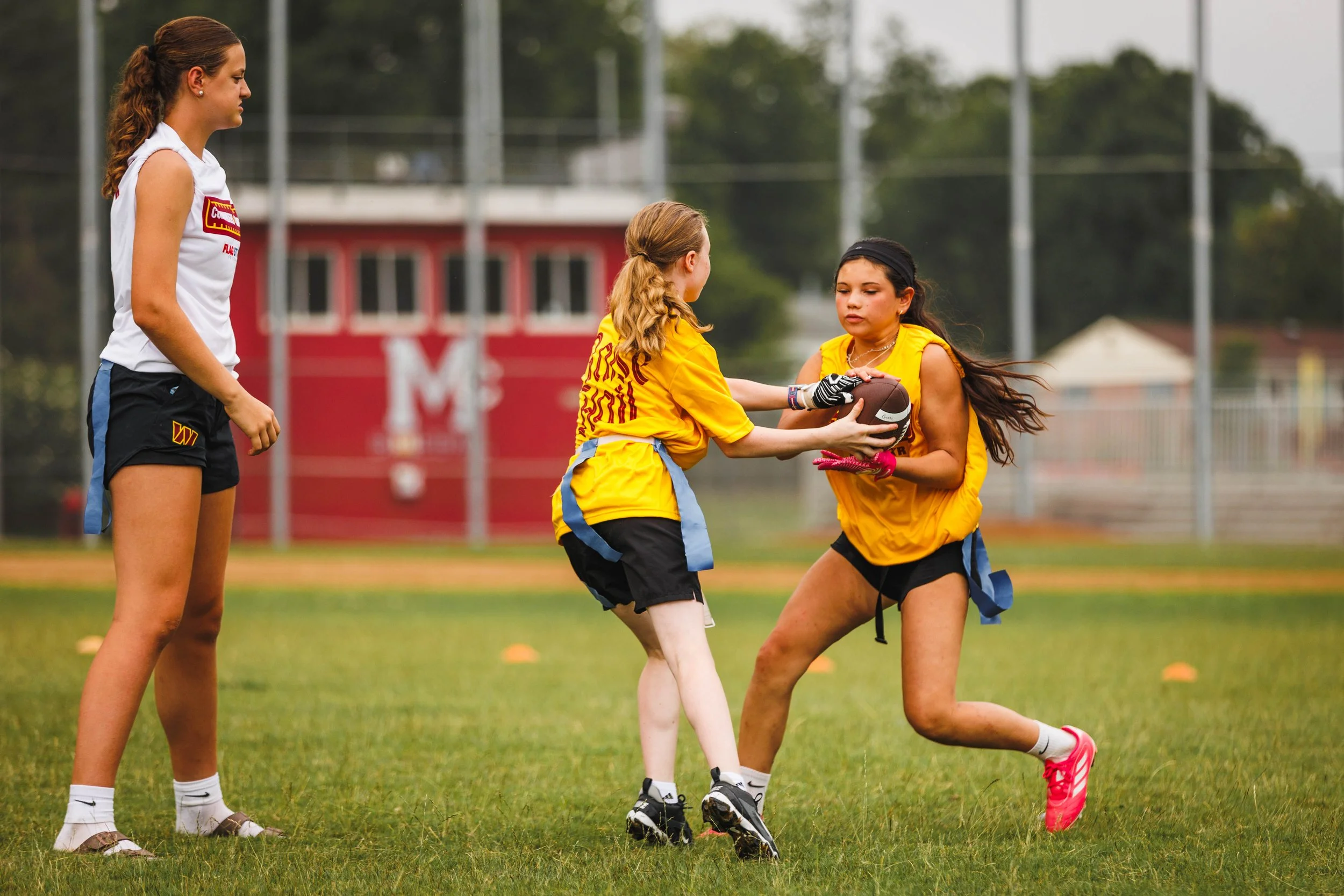 Ana Schnell Coaching at Commanders Camps in McLean.jpg
