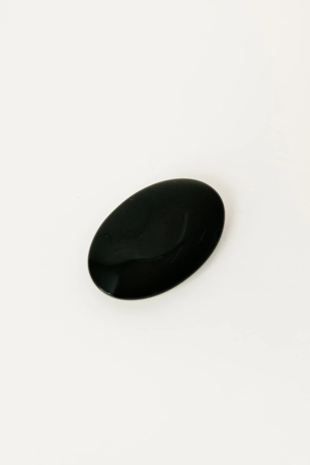 black obsidian palm stone