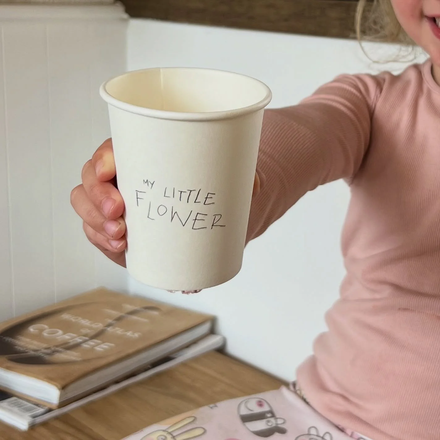 Our logo explained 🌸😊
As with our vision for the cafe, our logo needed to represent something of value. It needed to have meaning, and for there to be a story behind it that could be told over time. 
The coffee shop is named after my two girls, w