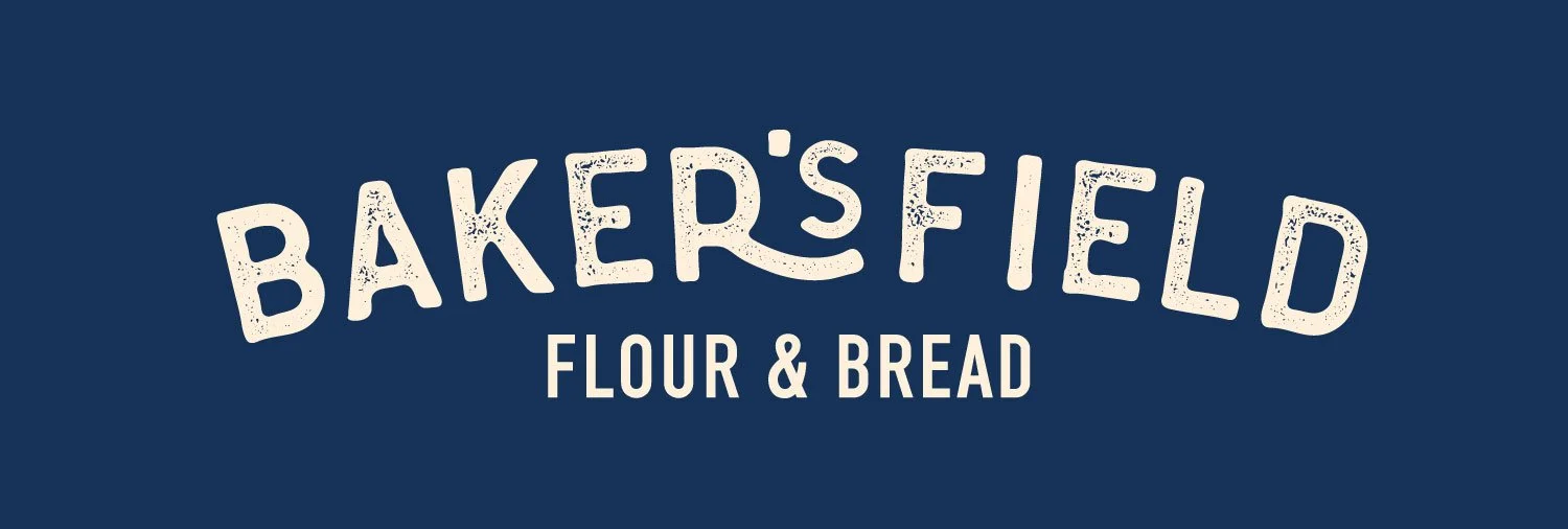Baker's Field Flour & Bread logo with white distressed text on a dark blue background.
