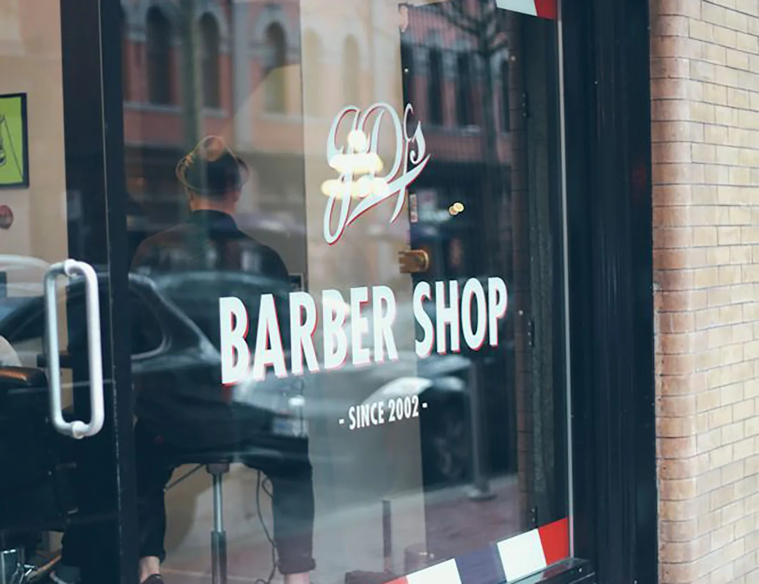 Custom barber shop and hair salon signage with window decals in Scottsdale, Arizona