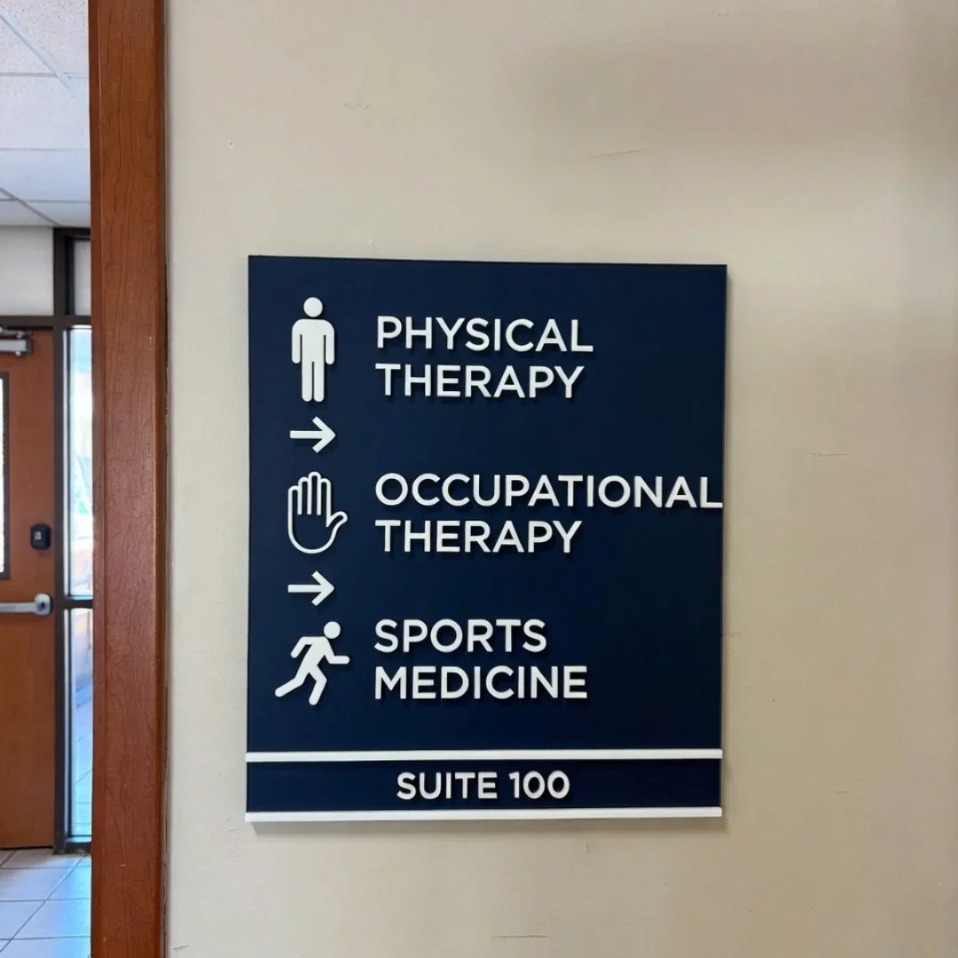 Sign listing directions to physical therapy, occupational therapy, and sports medicine in Suite 100.