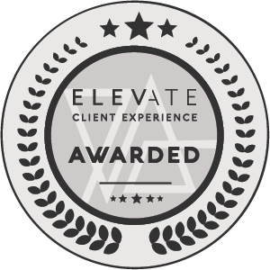 A circular badge with stars and moon symbols, featuring the words 'ELEVATE CLIENT EXPERIENCE AWARDED' in the center.