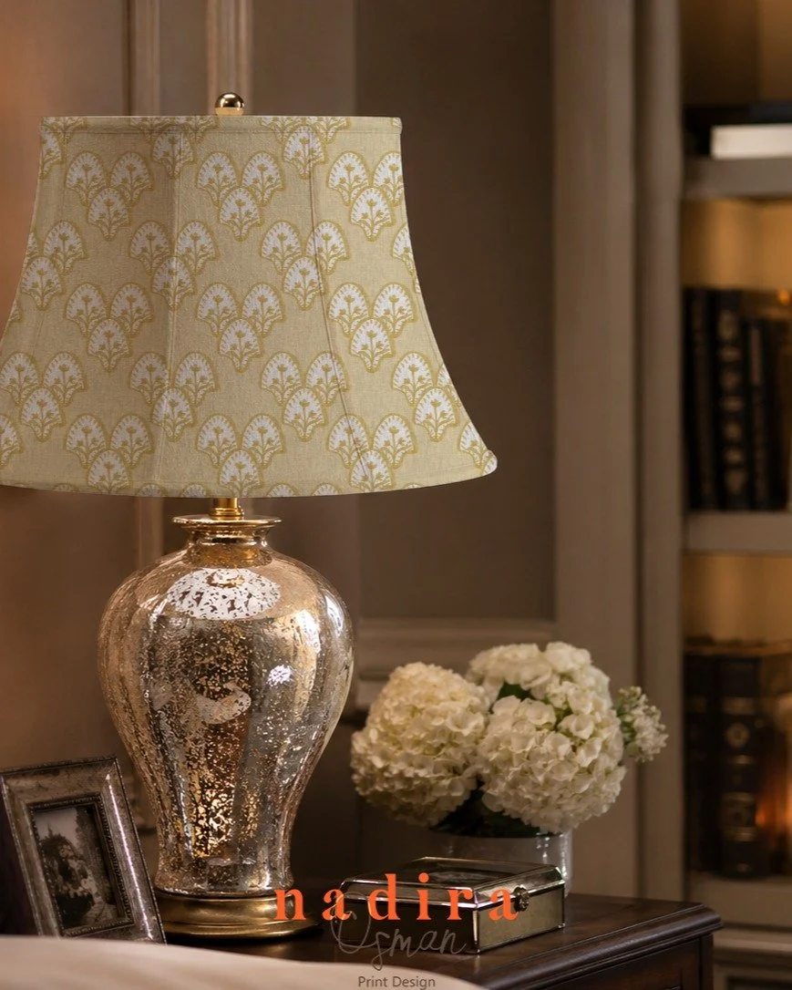 A warm, timeless print designed for cozy interiors. Soft golden motifs bring a subtle vintage charm to this lampshade, adding pattern, texture, and a refined glow to the room. Perfect for creating an inviting corner with a classic, collected feel.

#