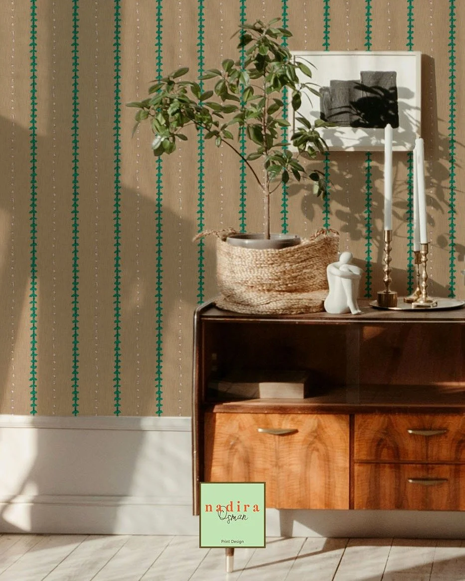 Loving the soft handcrafted feel of this wallpaper. The warm neutral tones mixed with the emerald vertical detailing give it a timeless, collected look that feels both classic and modern in the space. I also love how vertical stripes naturally add he