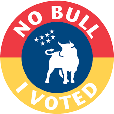 Circular badge with red, yellow, and blue sections displaying the message 'No Bull I Voted' and a white bull silhouette in the center.