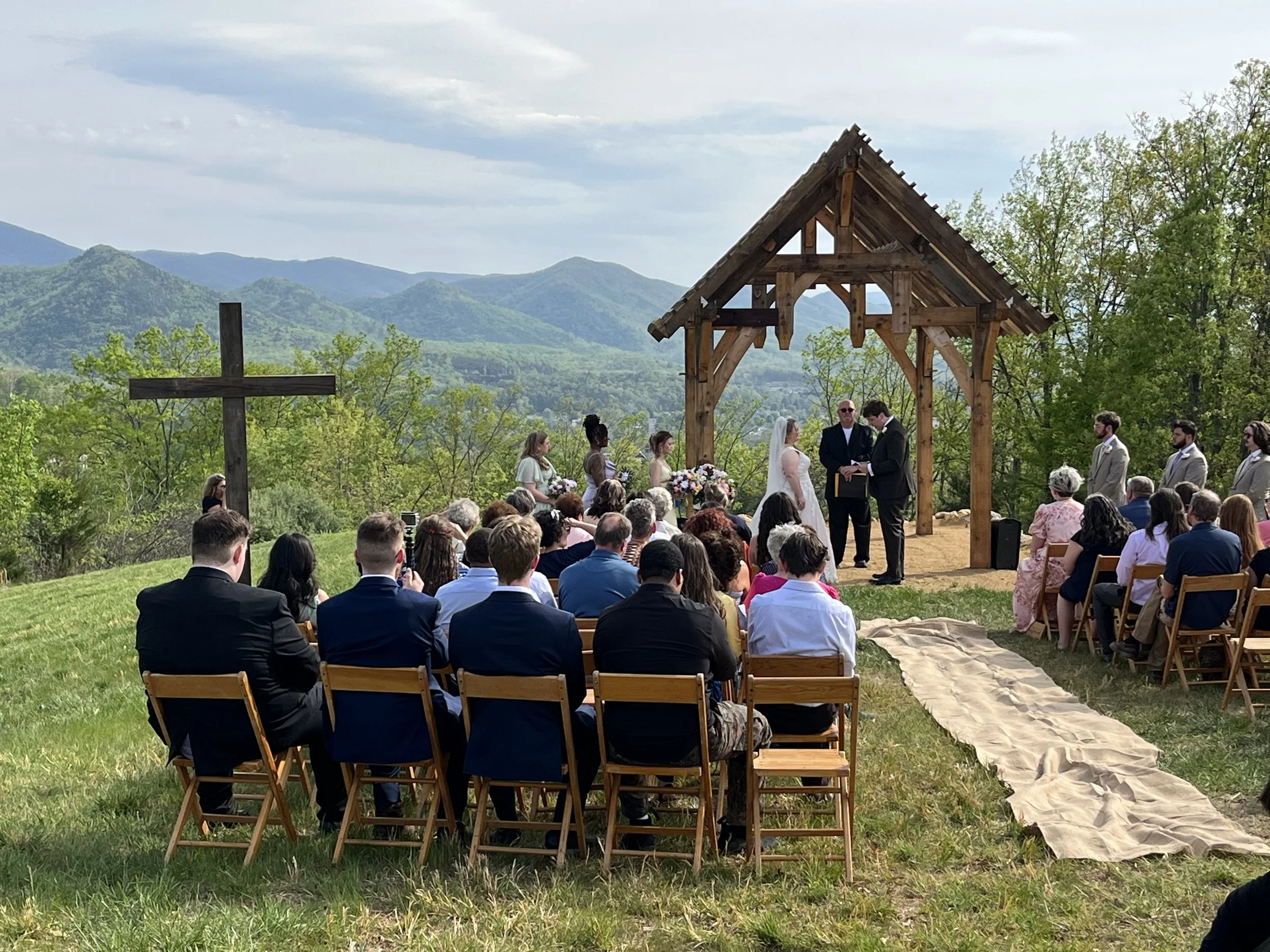 Wedding ceremony at the Bower on the Front Lawn with mountains views