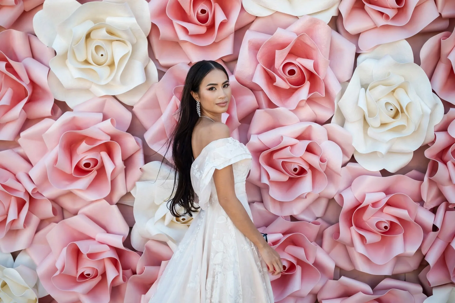 bride with huge flowers in the background.jpg