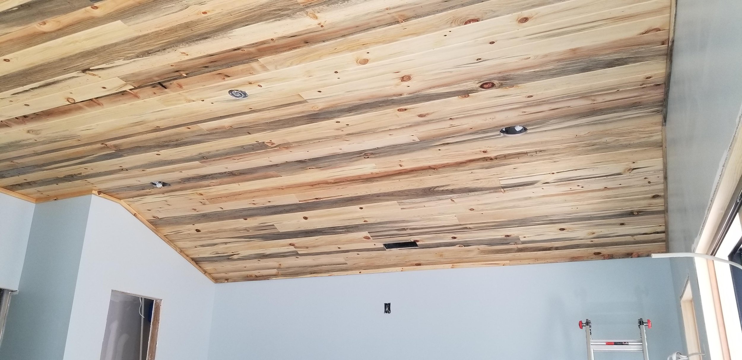 “Detailed interior trim and molding work, including custom baseboards, wainscoting, and crown molding in Waynesville, NC.”