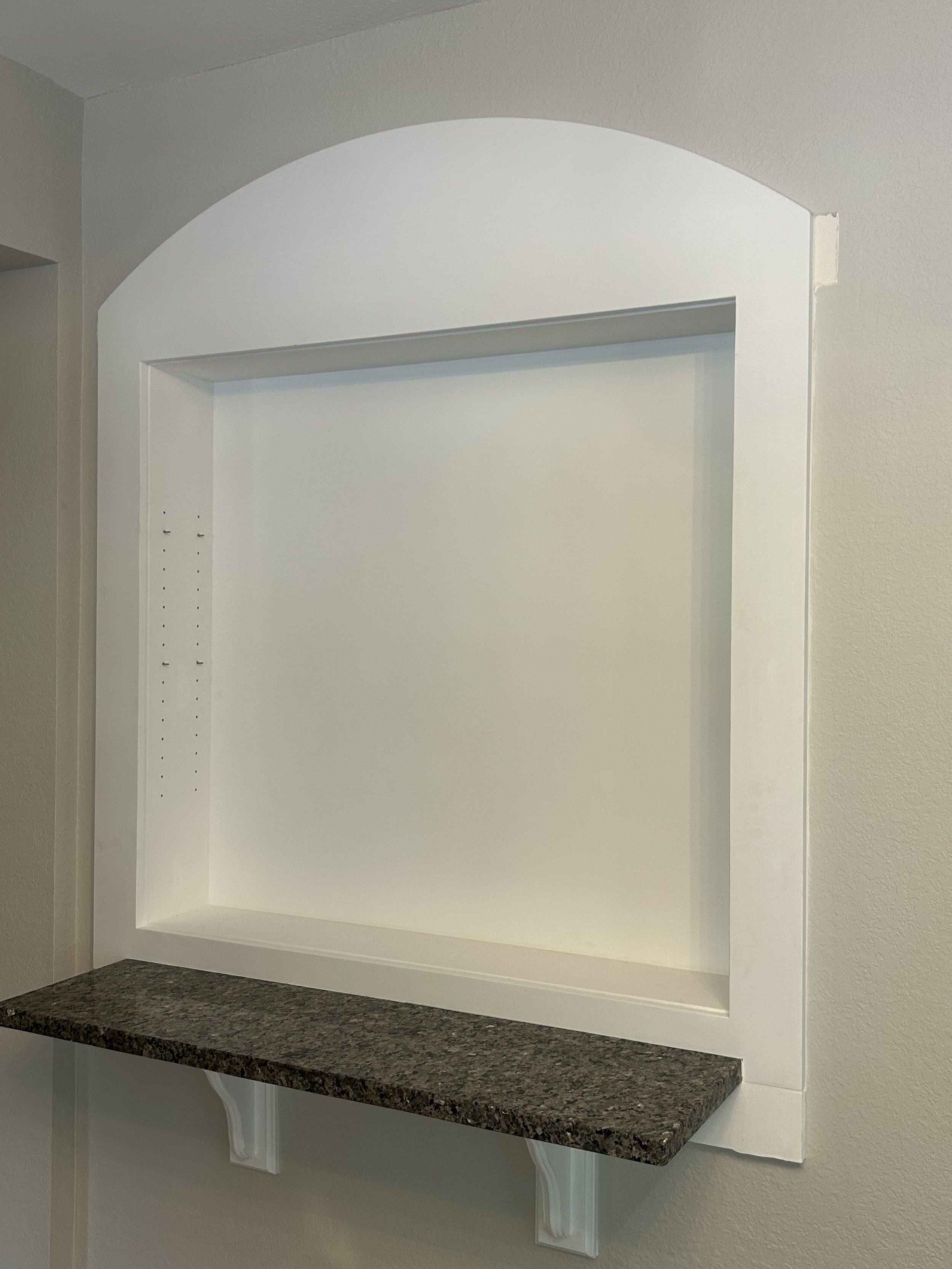 “Detailed interior trim and molding work, including custom baseboards, wainscoting, and crown molding in Waynesville, NC.”