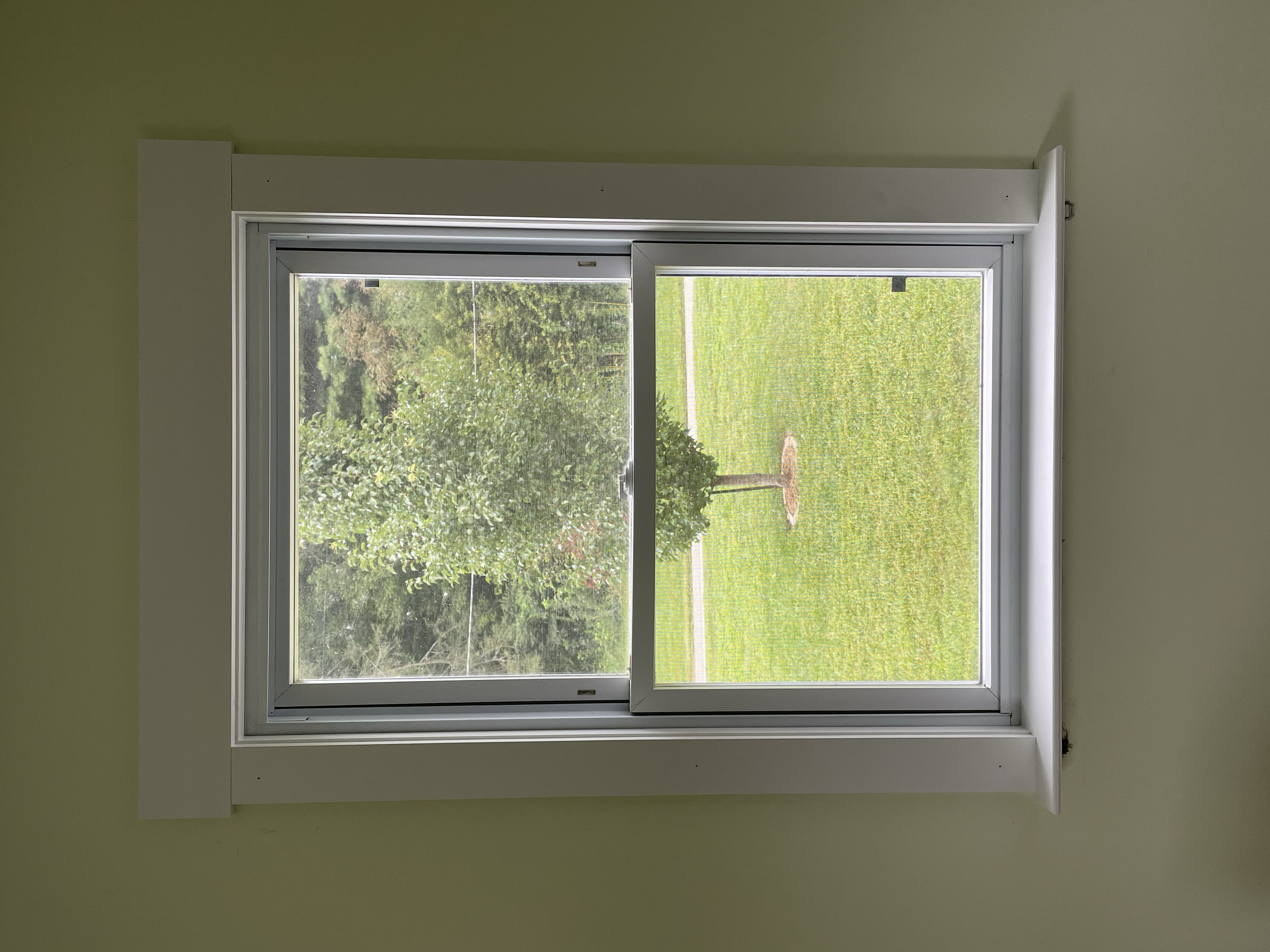 “Detailed interior trim and molding work, including custom baseboards, wainscoting, and crown molding in Waynesville, NC.”
