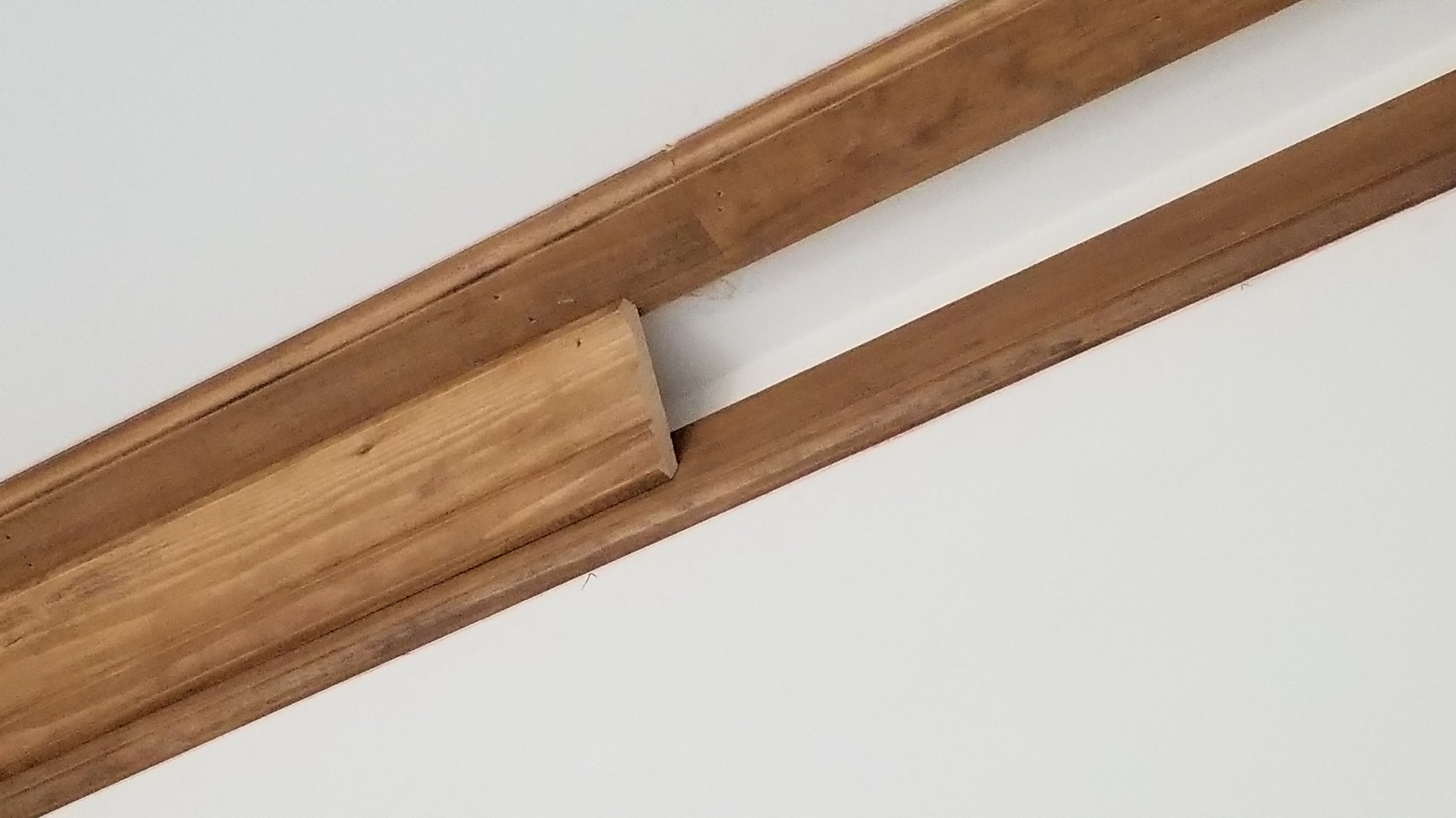 “Detailed interior trim and molding work, including custom baseboards, wainscoting, and crown molding in Waynesville, NC.”