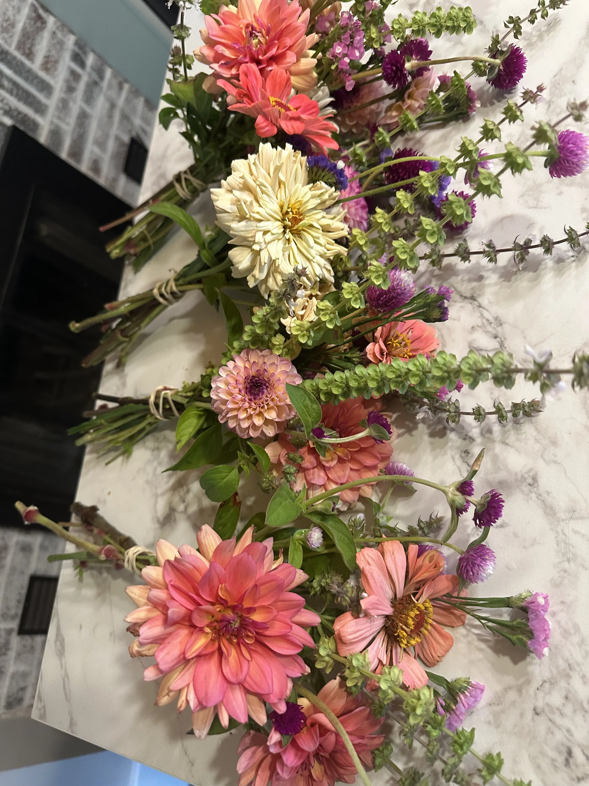 pink flowers on the counter
