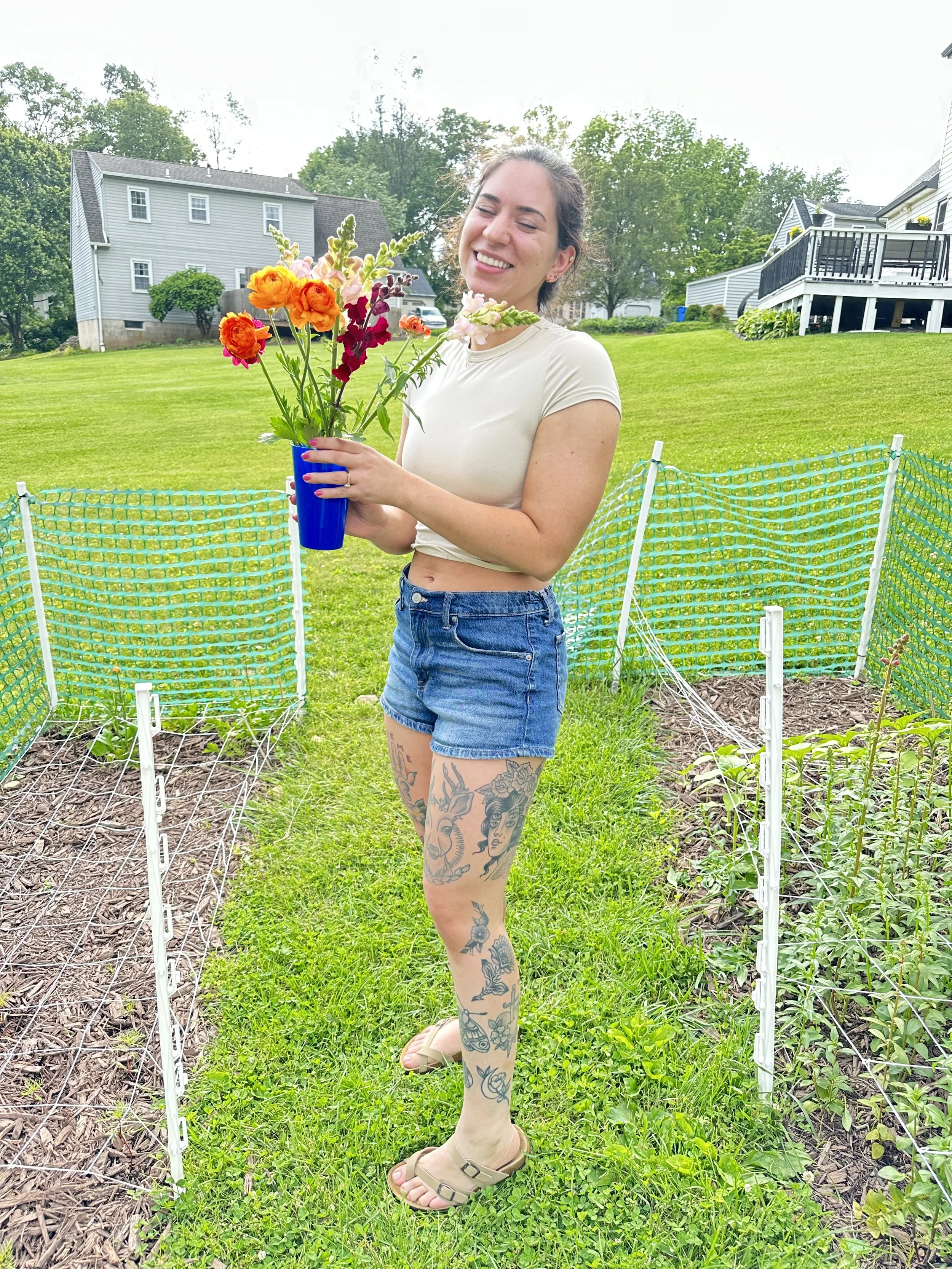 laughing holding flowers