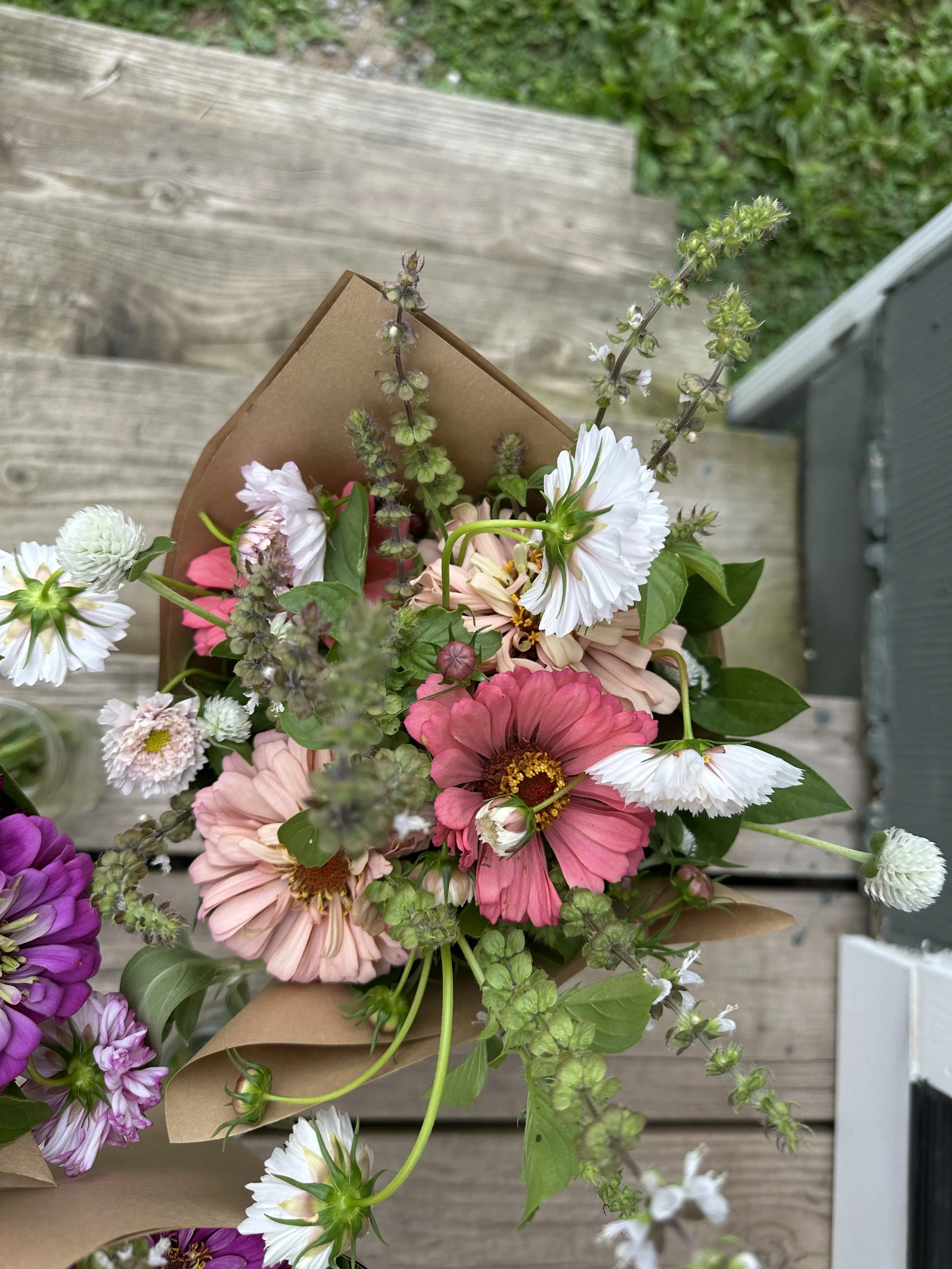 light and dark pink bouquet on porch