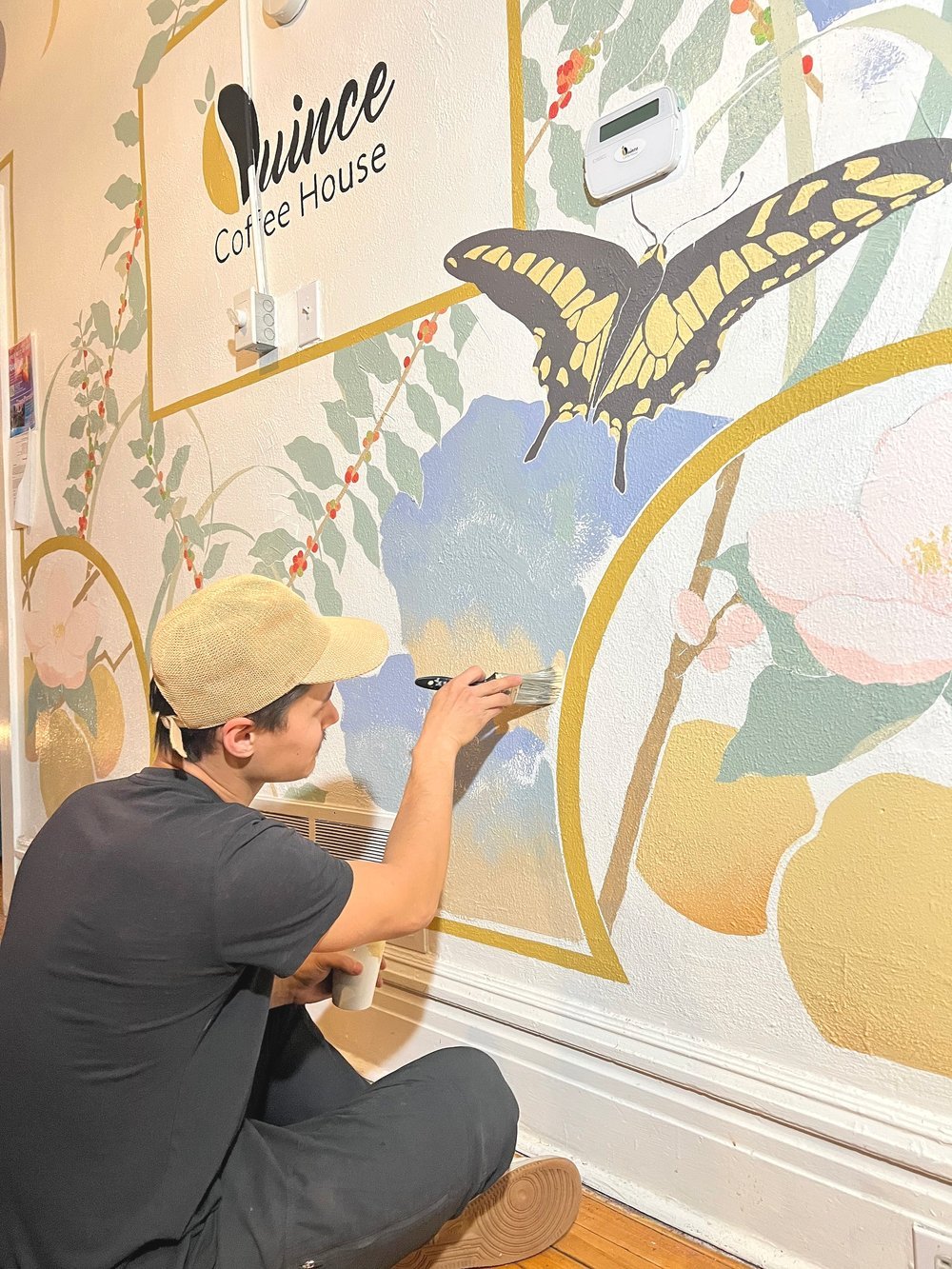 Conner Choi-Working on Quince Mural.jpg