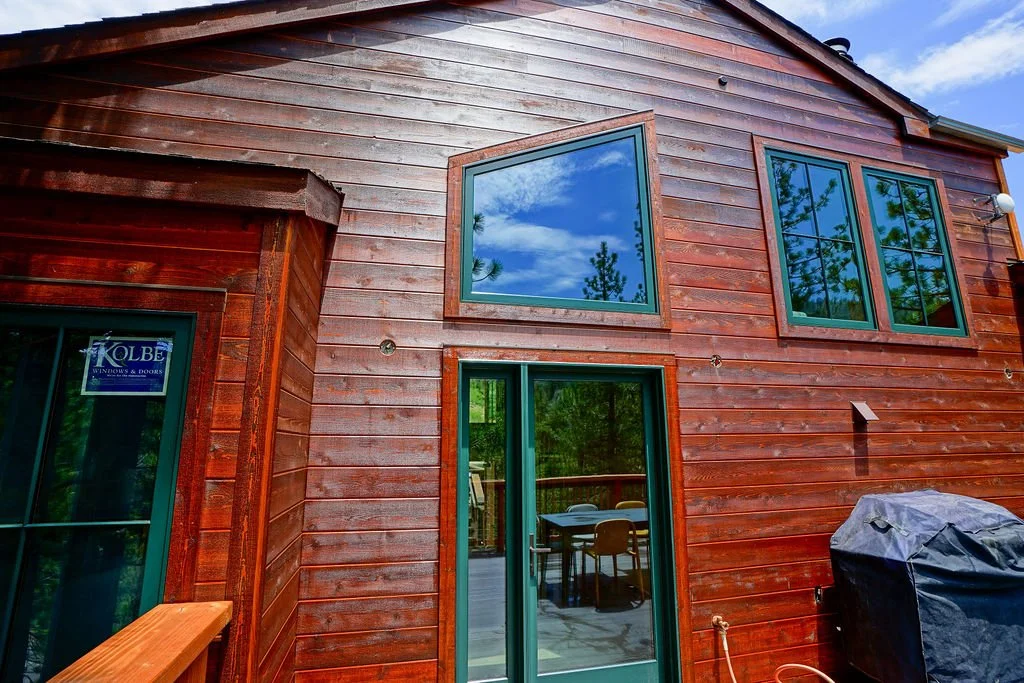 siding-door-angular-window-back-house.jpg