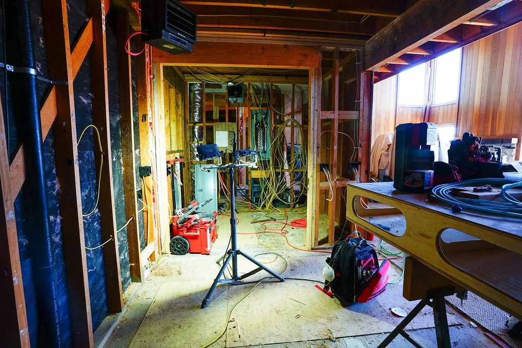 interior construction area with lights and wires