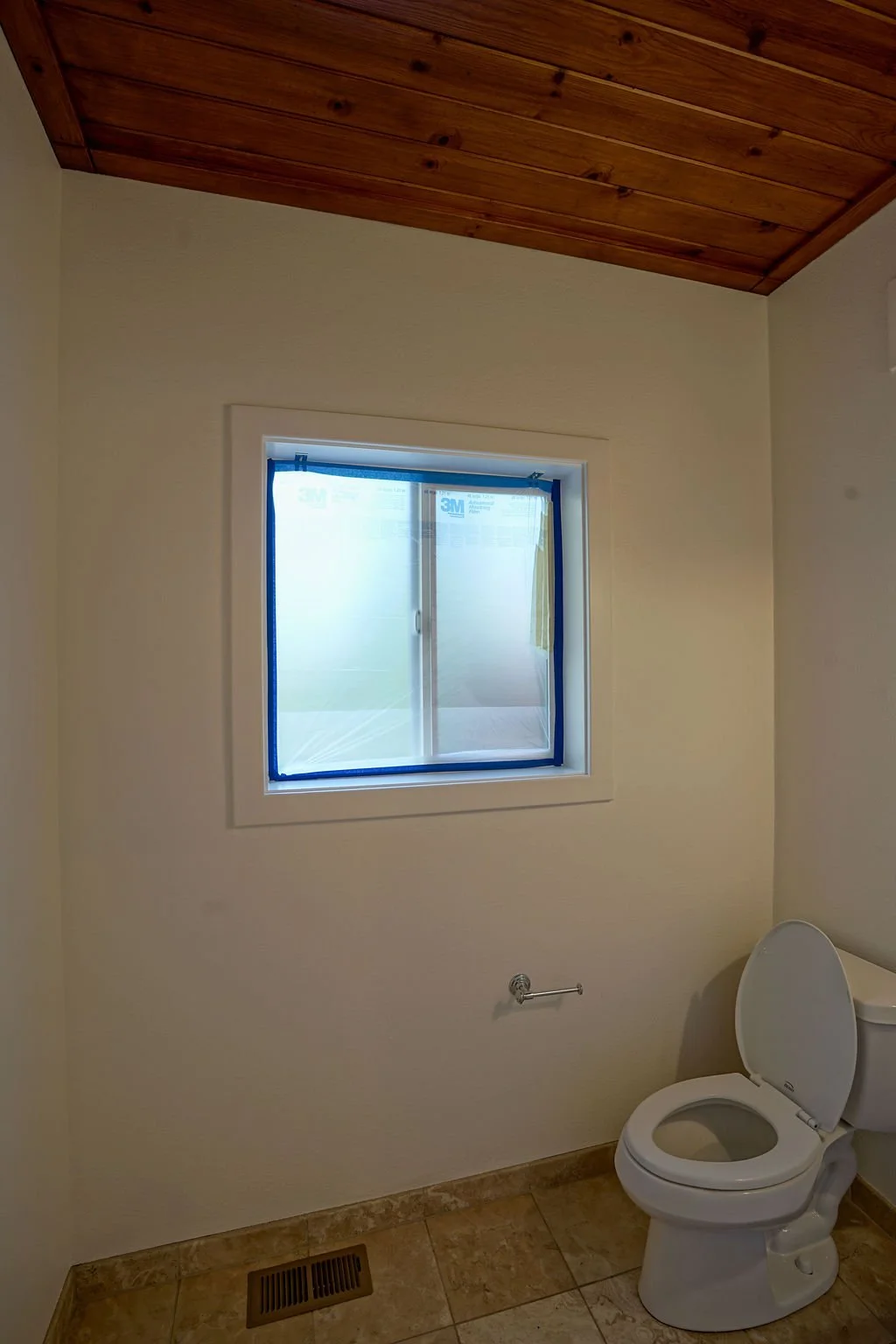 wall painted white in bathroom with toilet