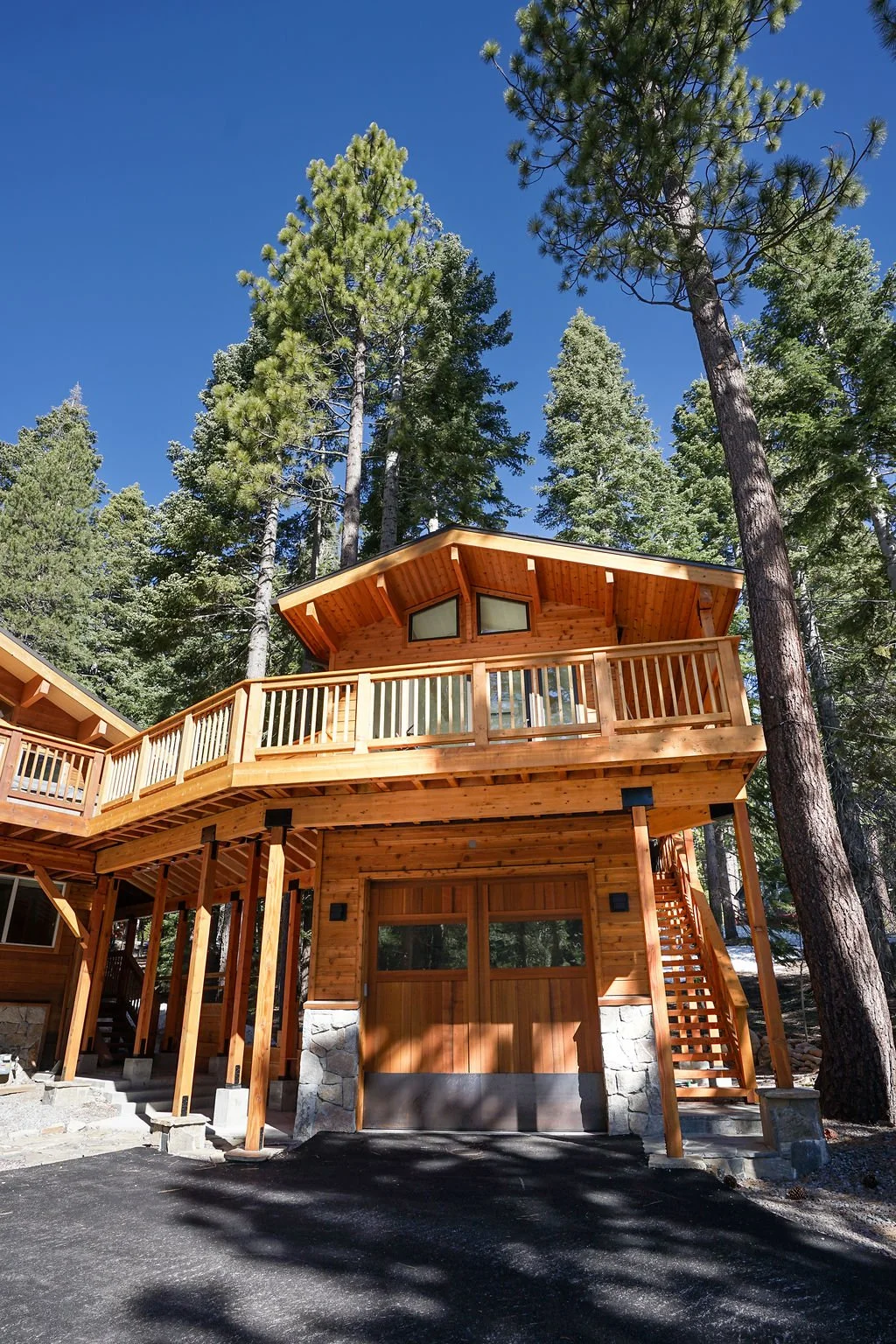 driveway single door garage with stairs to unit